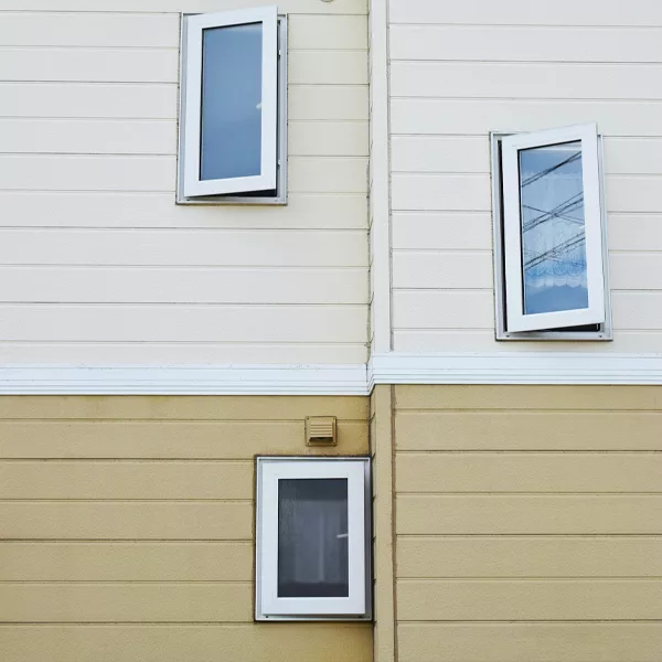 Ivory and tan colored vinyl siding